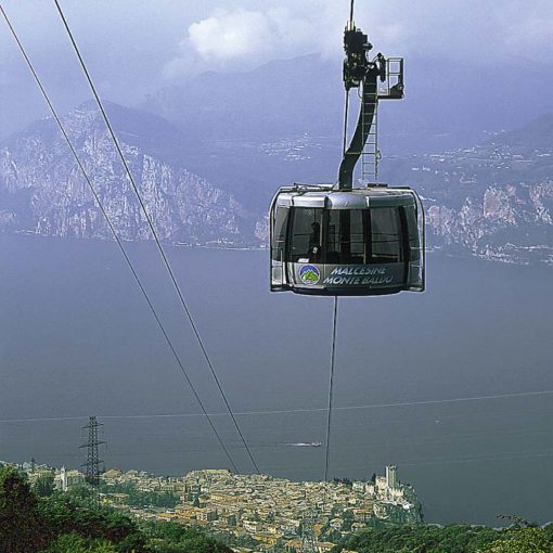 View of the Monte Baldo cable car rising from Malcesine, Italian Lakes, Italy